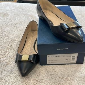 Cole Haan flats in black leather